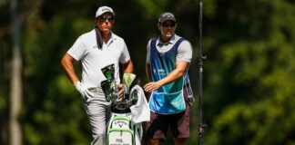 Phil Mickelson and the caddy on the seventh hole during the first round of the 2023 BMW Golf Championship.