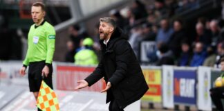 Robinson's first match as St Mirren coach ended in a loss of hearts

