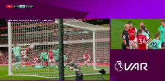 The VAR checks for a handball by Caglar Soyuncu