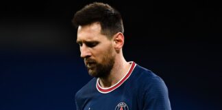 Lionel Messi looks dejected after PSG's defeat to Real Madrid
