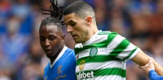 GLASGOW, SCOTLAND - AUGUST 29: Celtic's Tom Rogic (centre) holds off Joe Aribo (left) and Steve Davis during a cinch Premiership match between Rangers and Celtic at Ibrox, on August 29, 2023, in Glasgow, Scotland (Photo by Rob Casey / SNS Group)