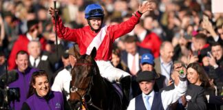 Rachael Blackmore celebrates winning the Cheltenham Gold Cup on A Plus Tard