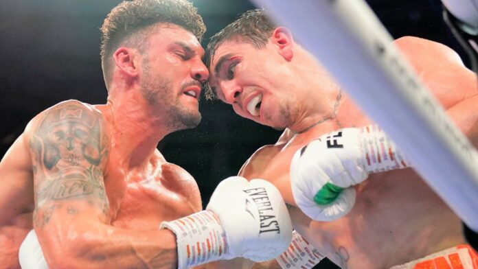 Conlan-Its-all-good-after-falling-out-of-the-ring.jpg Michael Conlan, Leigh Wood