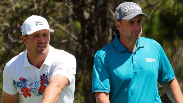DeChambeau-shares-the-spoils-with-Bland-Poulters-masters-program.jpg DeChambeau shares the spoils with Bland | Poulter's master's program hopes to take a risk