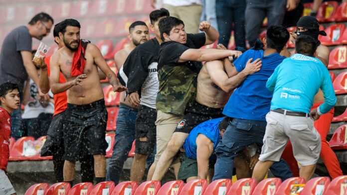 Fan-violence-in-Mexico-leads-to-injuries-and-suspension-of.jpg Fan violence in Mexico leads to injuries and suspension of matches