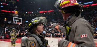 The clash between the Toronto Raptors and the Indiana Pacers is suspended as firefighters work to evacuate the building
