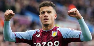 Philippe Coutinho celebrates scoring Villa's third goal