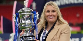 Chelsea manager Emma Hayes celebrates with the trophy after the Vitality Women's FA Cup final