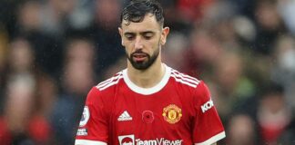 Bruno Fernandes looks dejected after City's opener