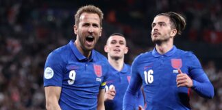 Harry Kane celebrates after giving England the lead from the penalty spot