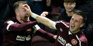 Hearts' Aaron McEneff celebrates making it 3-2 with Andy Halliday