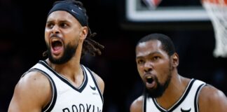 Patty Mills (left) and Kevin Durant of the Brooklyn Nets (getty)