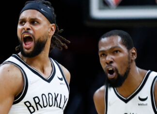 Mills: The networking state of affairs is not good, however we’re assured Patty Mills (left) and Kevin Durant of the Brooklyn Nets (getty)