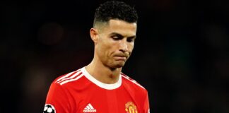 Cristiano Ronaldo walks off dejected after Manchester United's Champions League exit at the hands of Atletico Madrid