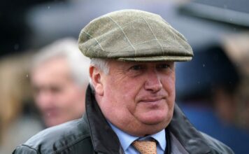 Nicholls boosts title cost with an Ascot double Nicholls boosts title charge with an Ascot double