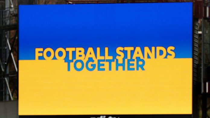 PL-EFL-suspend-broadcasts-in-Russia-PL-donates-1.jpg Football Stands Together - Ukraine support sign