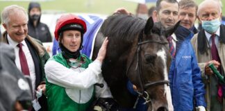 Martin Dwyer and Pyledriver in the winner's enclosure at Epsom after Coronation Cup success