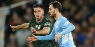 Bernardo Silva, Manchester City, right, takes on the Sporting Goncalo Inacio challenge 