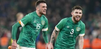 Troy Parrott (left) celebrates the late winner of the Republic of Ireland