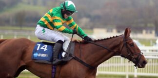 Jonjo O'Neill Jr rides Time To Get Up to victory in the 2023 Midlands Grand National for his father, Jonjo O'Neill.