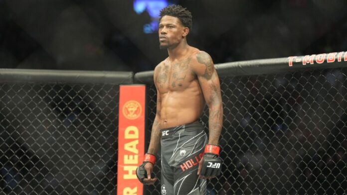 UFCs-Holland-subdues-the-gunman-with-an-MMA-move.jpg UFC's Holland subdues the gunman with an MMA move