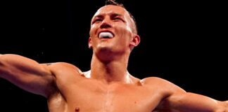 Josh Warrington celebrates regaining his world title