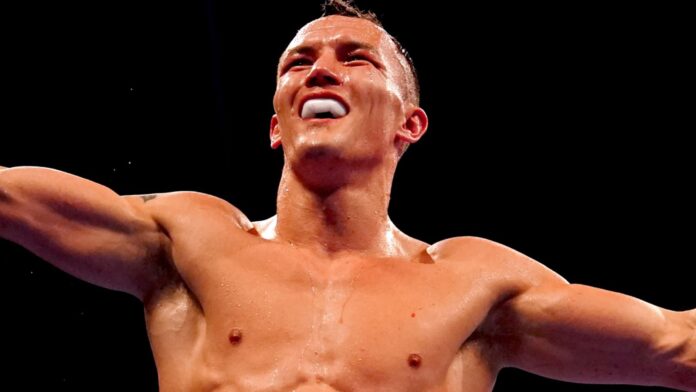 Warrington-suspends-Martinez-to-regain-the-world-title.jpg Josh Warrington celebrates regaining his world title