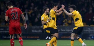 Wolverhampton players celebrate for the second time in the match, after Watford Kocho Hernandez (not pictured) scored an own goal.