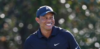 Woods beats Mickelson for Player Impact title


