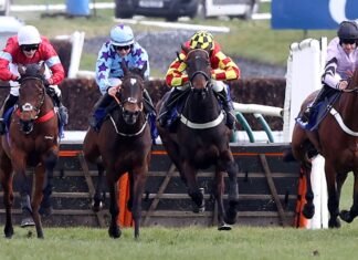 Anna Bonina trailing behind for Scottish Championship glory Anna Bunina (blue silks) wins the Coral Scottish Champion Hurdle