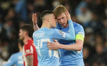 Phil Foden and Kevin De Bruyne celebrate during Manchester City's victory over Atletico Madrid at the Etihad Stadium
