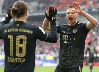 Euro spherical: Bayern performs with 12 gamers on its solution to victory Joshua Kimmich celebrates with Marcel Sabitzer during Bayern's 4-1 win at Freiburg