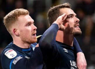 Huddersfield is again heading in the right direction after a troublesome win over Hull’s 10-man Harry Tovolo at Huddersfield Town celebrates scoring against Hull