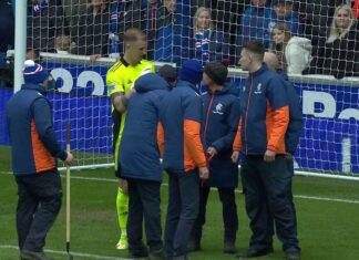 The conflict of historic powers stopped after a glass bottle was thrown onto the sphere Stewards helped clear the penalty area after Joe Hart alerted referee Willie Collum