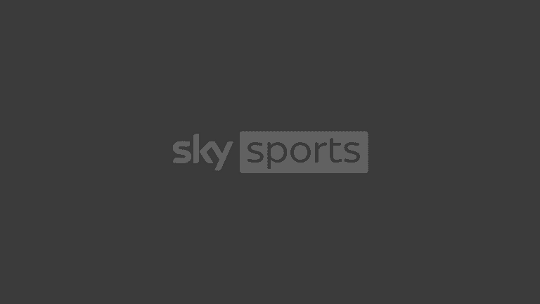 DeChambeau throws the driver after a stray shot