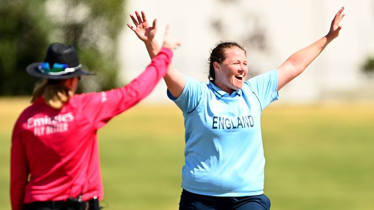 Anya Shropsol celebrates taking Dipty Sharma's hand during England's win over India