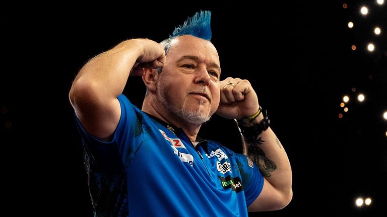 Wright celebrates after defeating Johnny Clayton in the final during the Premier League final in Cardiff (Image source: Stephen Paston/PDC)