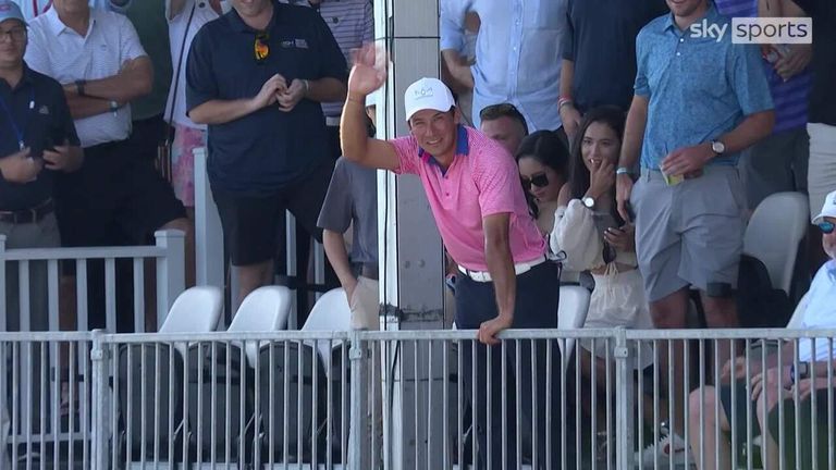 Martin Contini, newcomer to the PGA Tour, joins the fans in the stands after a misguided shot at the third round of the Honda Classic