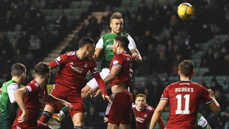 Edinburgh, Scotland - DECEMBER 22: Hibernians' Ryan Porteous scored Hibernian's 1-0 lead during a match between Hibernian and Aberdeen at Easter Road, on December 22, 2023, in Edinburgh, Scotland.  (Photo by Ross Parker/SNS Group)