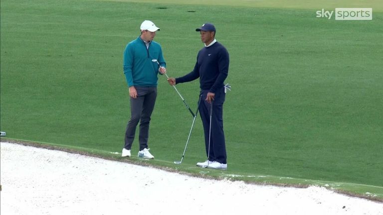 Tiger Woods and Rory McIlroy share a conversation as they both train in Augusta ahead of this week's Masters Tournament.