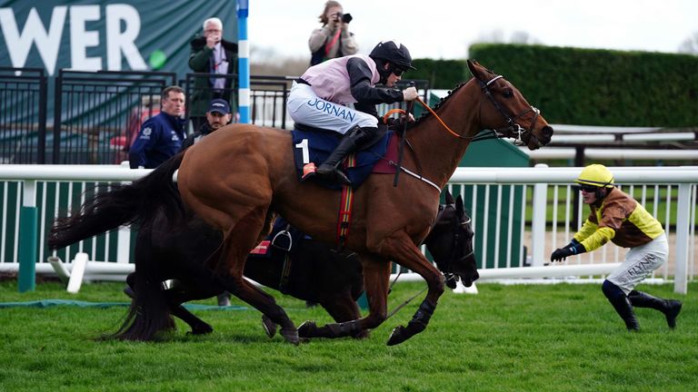 Rachel Blackmore's Bob Ollinger overtakes Paul Taunin's Gallopin de Champs en route to victory in Turner's Novices' Race  Chase on day three of the Cheltenham Festival at Cheltenham Racecourse.  Photo date: Thursday, March 17, 2023.