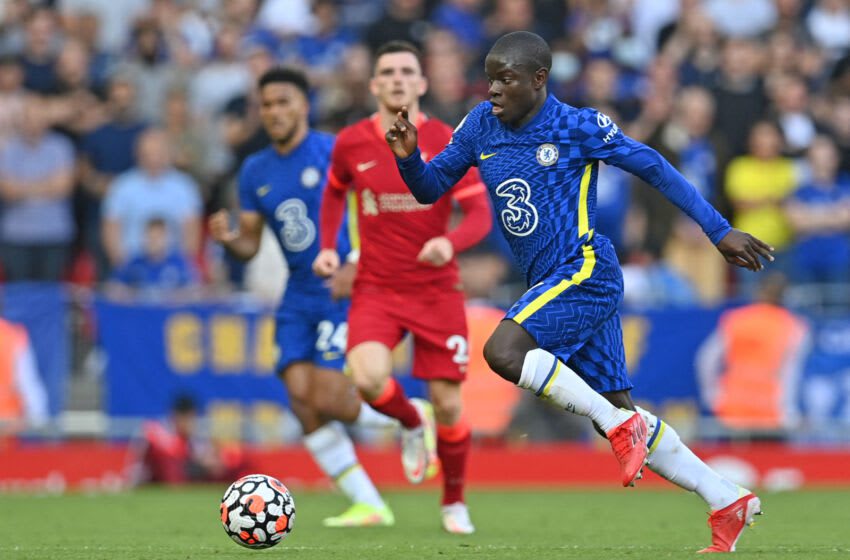 Chelsea's French midfielder N'Golo Kante runs with the ball during the Premier League soccer match between Liverpool and Chelsea at Anfield in Liverpool, northwest England on August 28, 2023. - - Restricted for editorial use.  No use with audio, video, data, fixture lists, club/league logos or services 