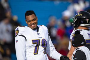 Ronnie Stanley in a baseball game: Ronnie Stanley #79 of the Baltimore Ravens warms up before the game against the Buffalo Bills at New Era Field on December 8, 2019 in Orchard Park, New York. Baltimore defeats Buffalo 24-17. Brett Carlsen/Getty Images