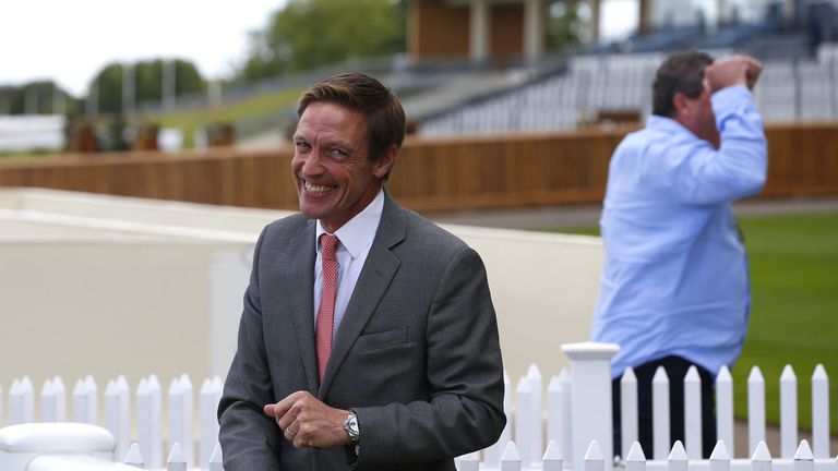 Richard Hughes smiles after calling for the Wind's victory at Goodwood last year