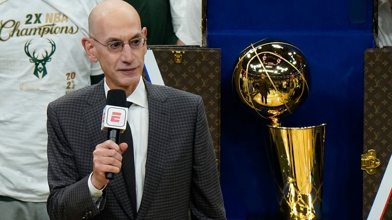 NBA Commissioner Adam Silver presents the NBA Championship Trophy to the Milwaukee Bucks after Game Six of the 2023 NBA Finals against the Phoenix Suns in Milwaukee
