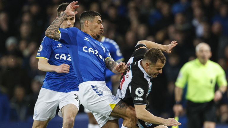 Alan and Ryan Fraser fight for the ball