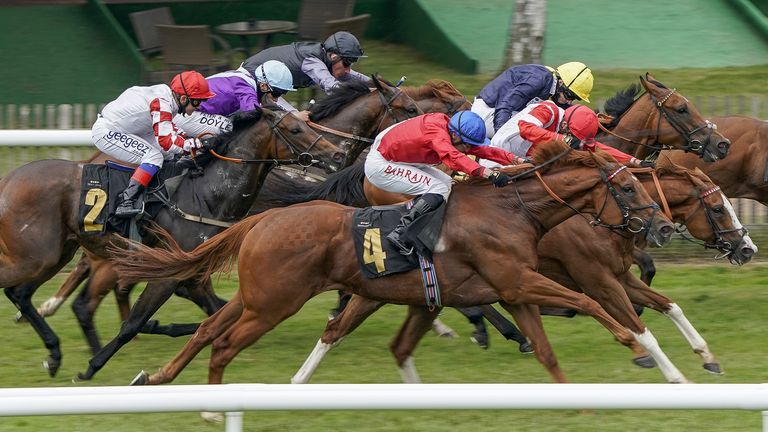 Tom Marquand riding an amethyst (red/blue hat) wins the entry prize to the Newmarket Grand Prix Sponsorship 