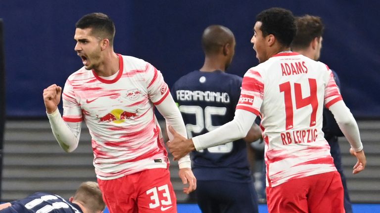 Andre Silva celebrates after doubling Leipzig's lead against Man City