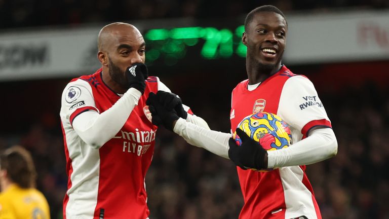 Arsenal Nicolas Pepe (right) celebrates with Alexandre Lacazette after scoring against Wolves