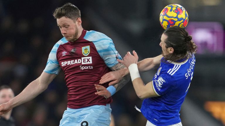 Out Wighurst competes for the ball with Leicester Caglar Soyunko